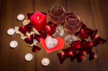 Candles, Red Roses Petals and Wine - Valentines Day Concept