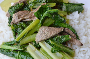stir-fried Chinese cabbage with pork liver on plain rice