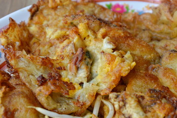 fried mussel omelet on dish