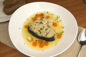 Shark soup in a white plate