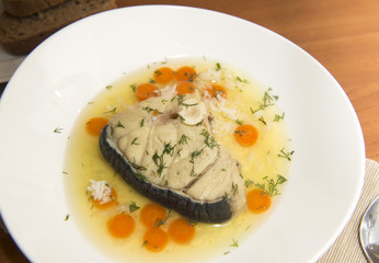 Shark soup in a white plate
