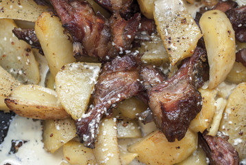 Grilled pork ribs with baked potatoes