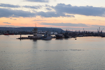 Fototapeta premium Varna harbor with cargo docks after sunset