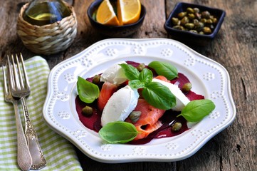 beet salad, soft cheese and smoked salmon with capers and olive oil.