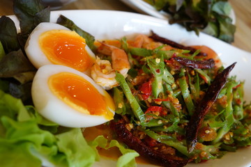 Winged bean spicy salad with boiled egg and shrimp