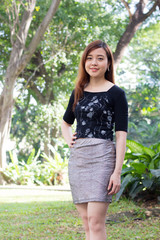 Fototapeta premium Portrait of thai adult businesswoman beautiful girl relax and smile