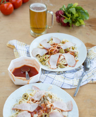 plates of pasta with ingredients