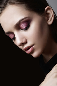 Beautiful young girl in studio close-up, beauty concept