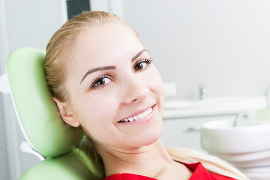 Face of dental woman patient with beautiful smile