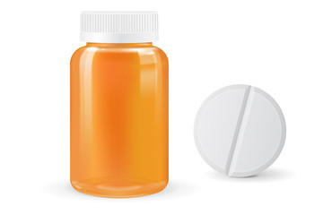 Medical bottle for pills and white tablet.