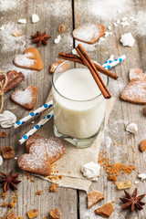 Glass of milk on a rustic wooden table