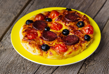 hot homemade pizza  heart with cheese, tomatoes, olives
