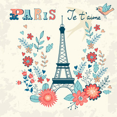 Fototapeta na wymiar Concept love card with Eiffel tower and floral wreath