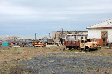 Fototapeta na wymiar Abandoned industrial area at Arctic town Pevek