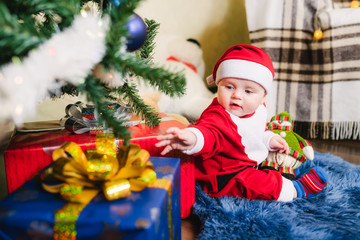 Baby dressed in Santa Claus