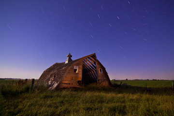 abandoned barn at night