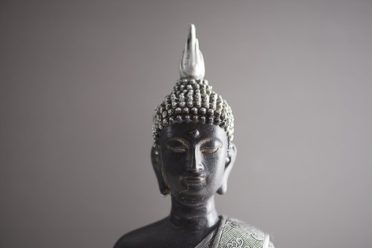Buddha figure colro gray and black