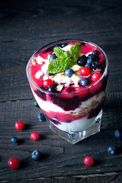 Dessert with yougurt,  jam and berries