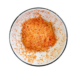 Grated carrots in the dish.