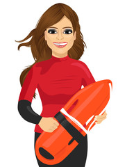 female lifeguard holding a rescue can