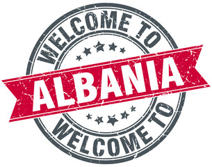 welcome to Albania red round vintage stamp