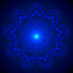 Hand drawn shine blue flower mandala over dark blue