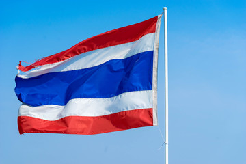 Fototapeta na wymiar thai flag on blue sky