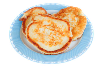 Fresh delicious muffins on a blue plate