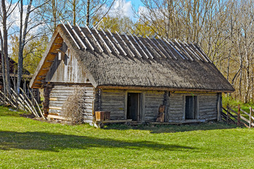 Fototapeta na wymiar Old barn with thatch and two doors