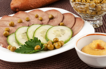 Slices of boiled beef tongue