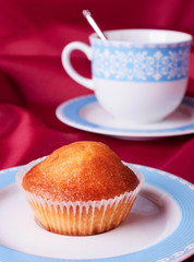 Cake and blue tea cup