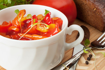 Lecho in a white ceramic cup.