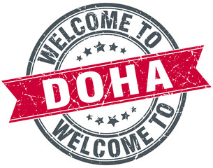 welcome to Doha red round vintage stamp