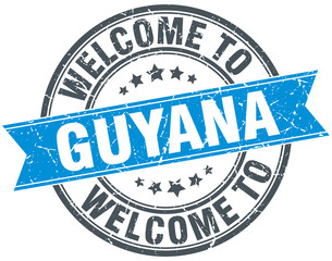 welcome to Guyana blue round vintage stamp