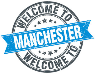 Fototapeta premium welcome to Manchester blue round vintage stamp