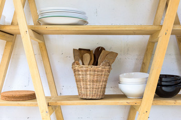 Fototapeta na wymiar Kitchen wood shelf with Home Kitchen Wares