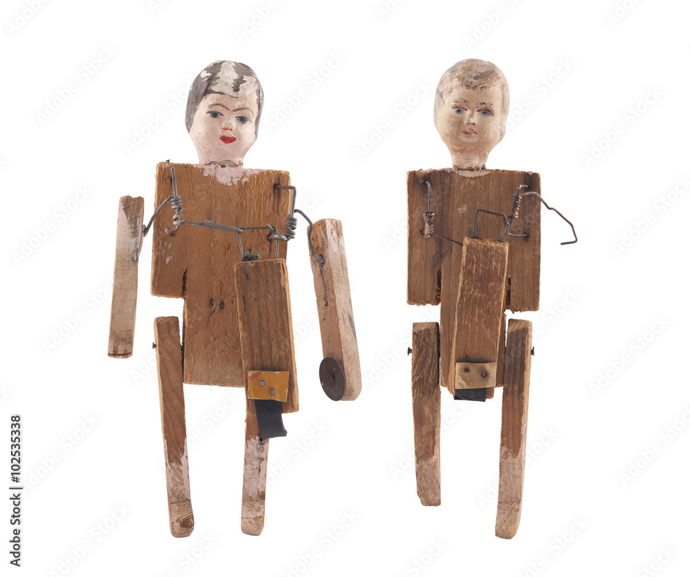 Wall mural Vintage wooden dolls isolated on white background with clipping path