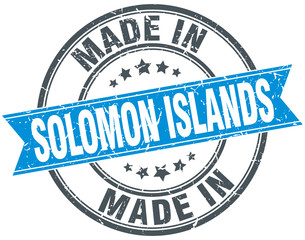 made in Solomon Islands blue round vintage stamp