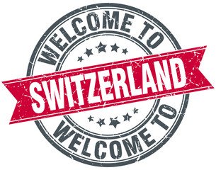 welcome to Switzerland red round vintage stamp