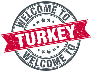welcome to Turkey red round vintage stamp
