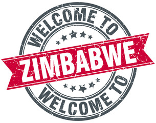 welcome to Zimbabwe red round vintage stamp