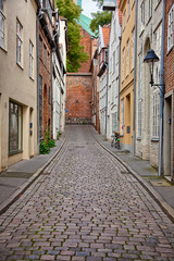Fototapeta premium Urban scene in the historic old town of Lubeck, Germany