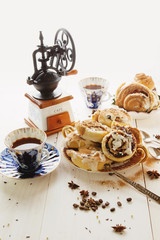 Cinnabons with raisins, cinnamon and vanilla sauce