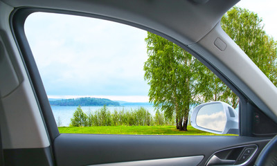 landscape with river from car window