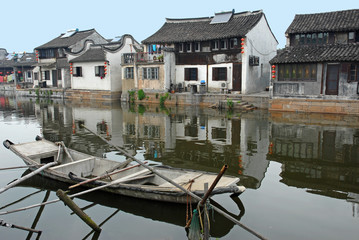 Fototapeta na wymiar Old houses reflection at Xitang village main canal.