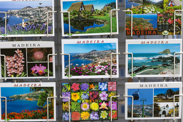 Fototapeta na wymiar MADEIRA - JUNE 25, : Colorful Madeira postcards offered for sale