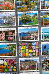 Fototapeta na wymiar MADEIRA - JUNE 25, : Colorful Madeira postcards offered for sale