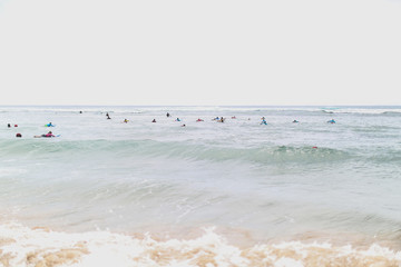 surfers go to the sea