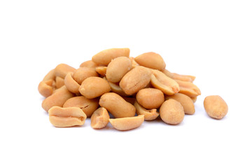 Arranged peanuts peeled and isolated on white background
