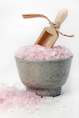 Close up of pink bath salts.